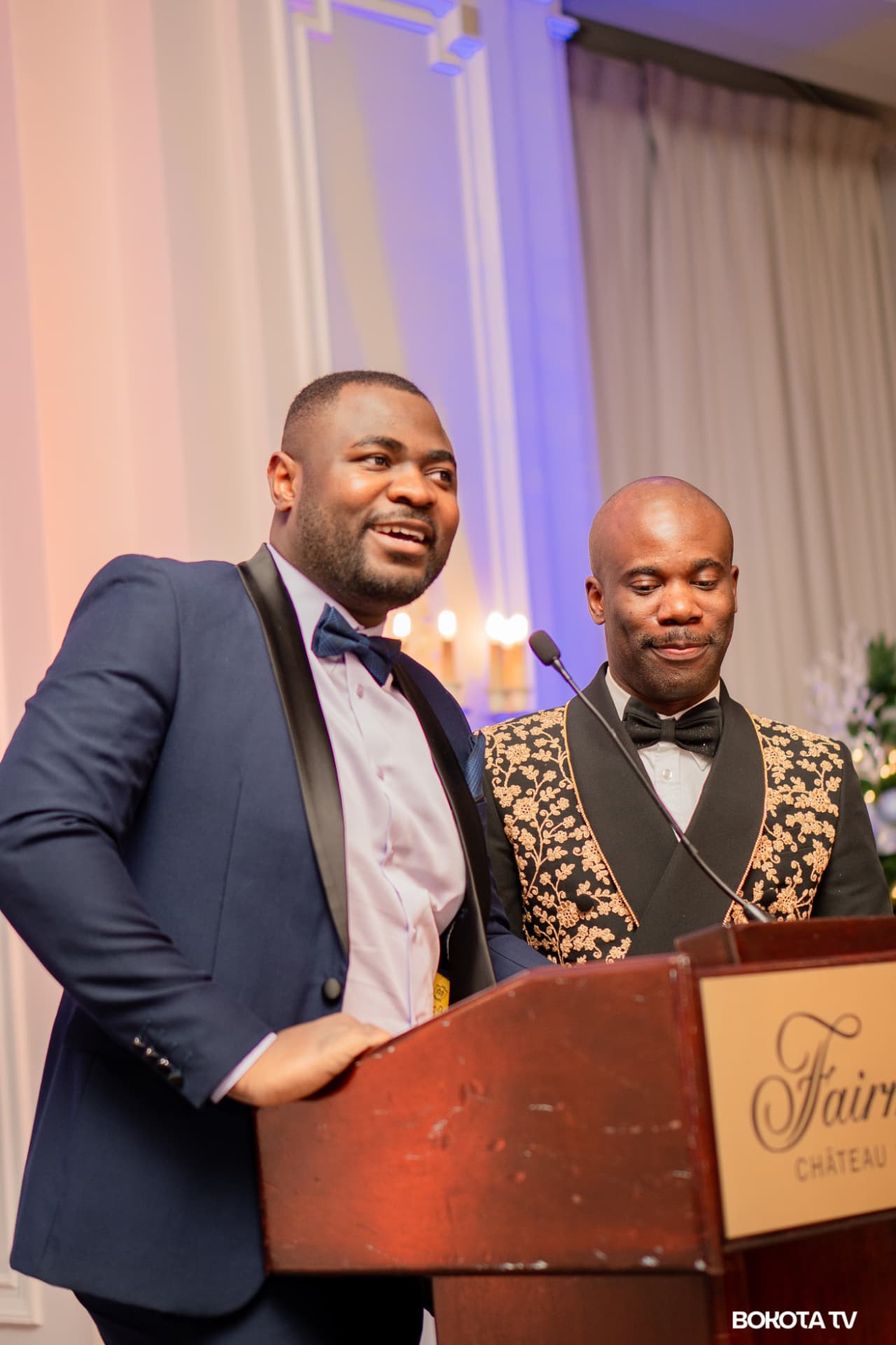 Two hosts at the Fairmont Château Laurier podium during the gala programme