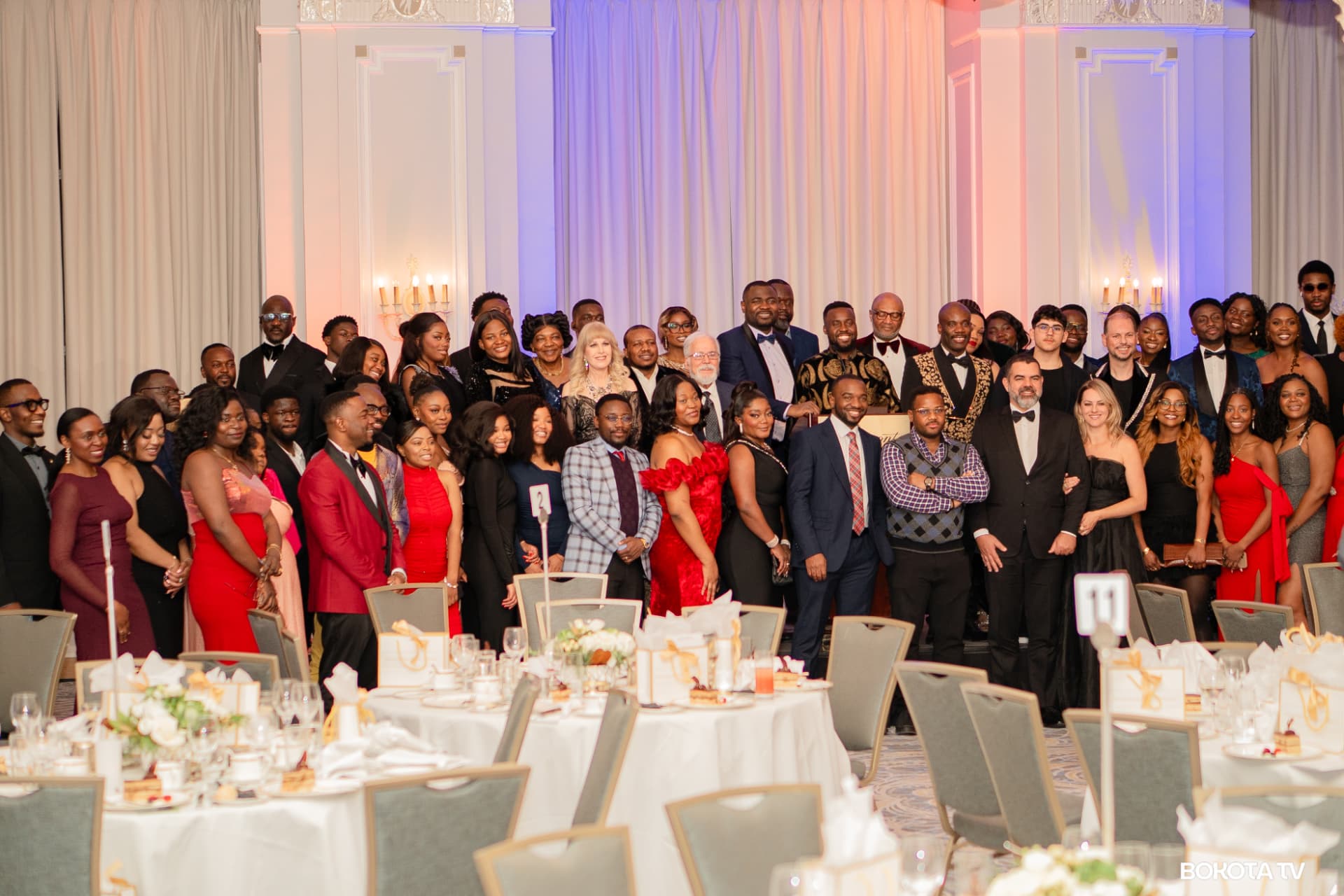 Full group photograph of the gala guests in the Fairmont Château Laurier ballroom